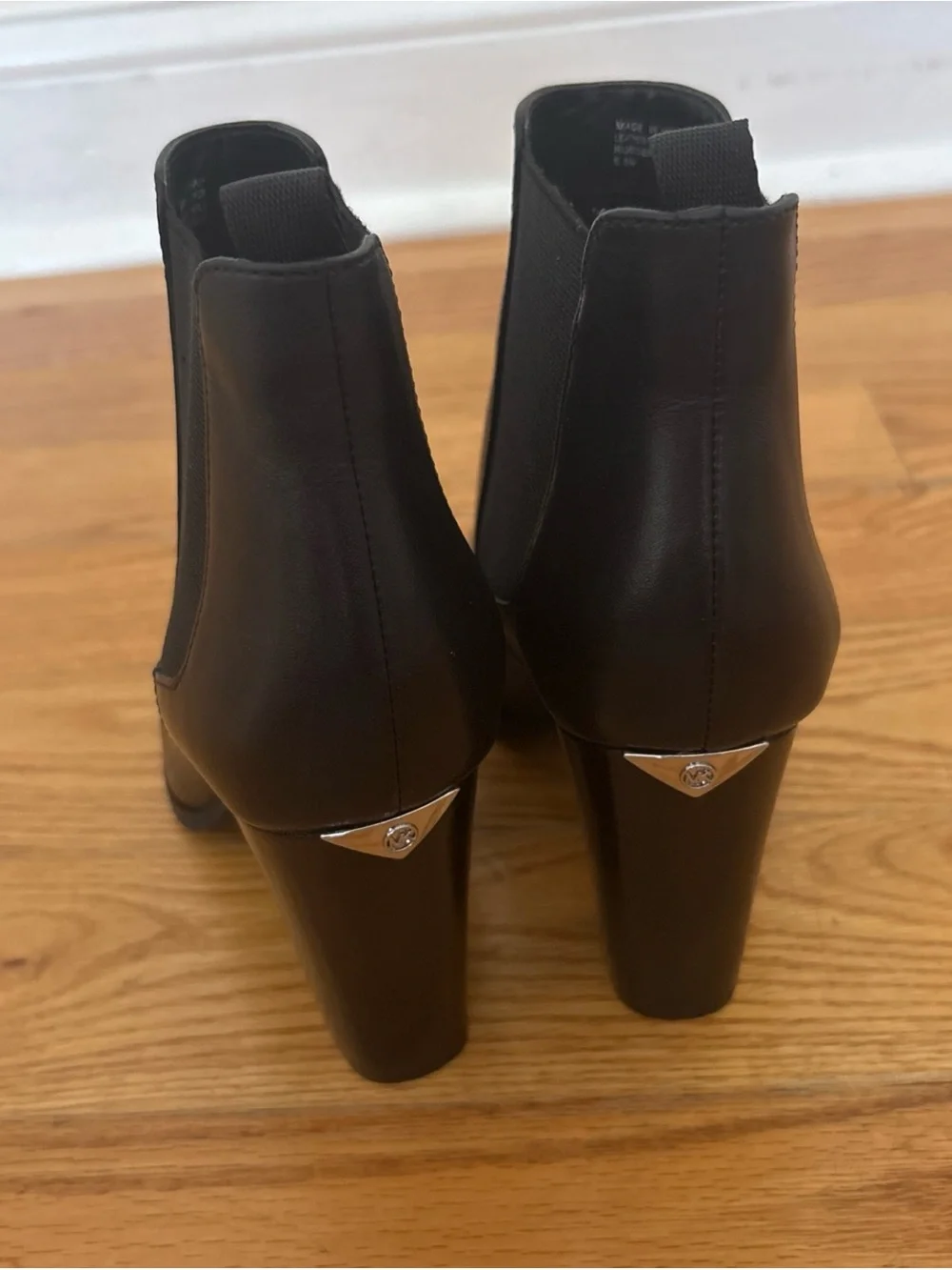 Michael Kors Black Leather Chelsea Block Heel Booties with Metal Accent